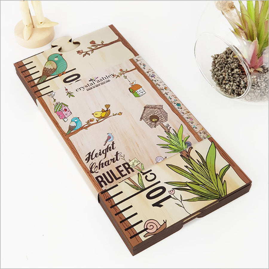 Eco-friendly growth chart with playful bird design, measuring height up to 1.5 meters, includes five puzzle pieces for fun.
