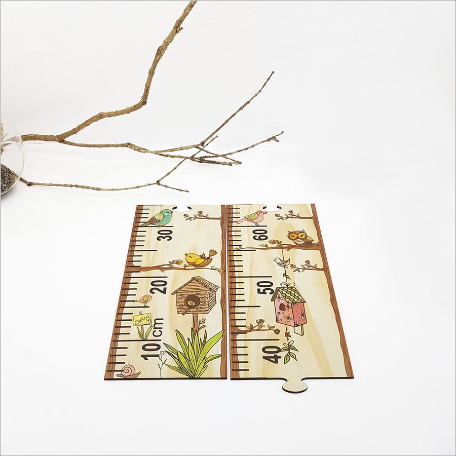 Height chart ruler featuring playful bird designs, made from eco-friendly pine veneer, measuring 1.5 meters tall.