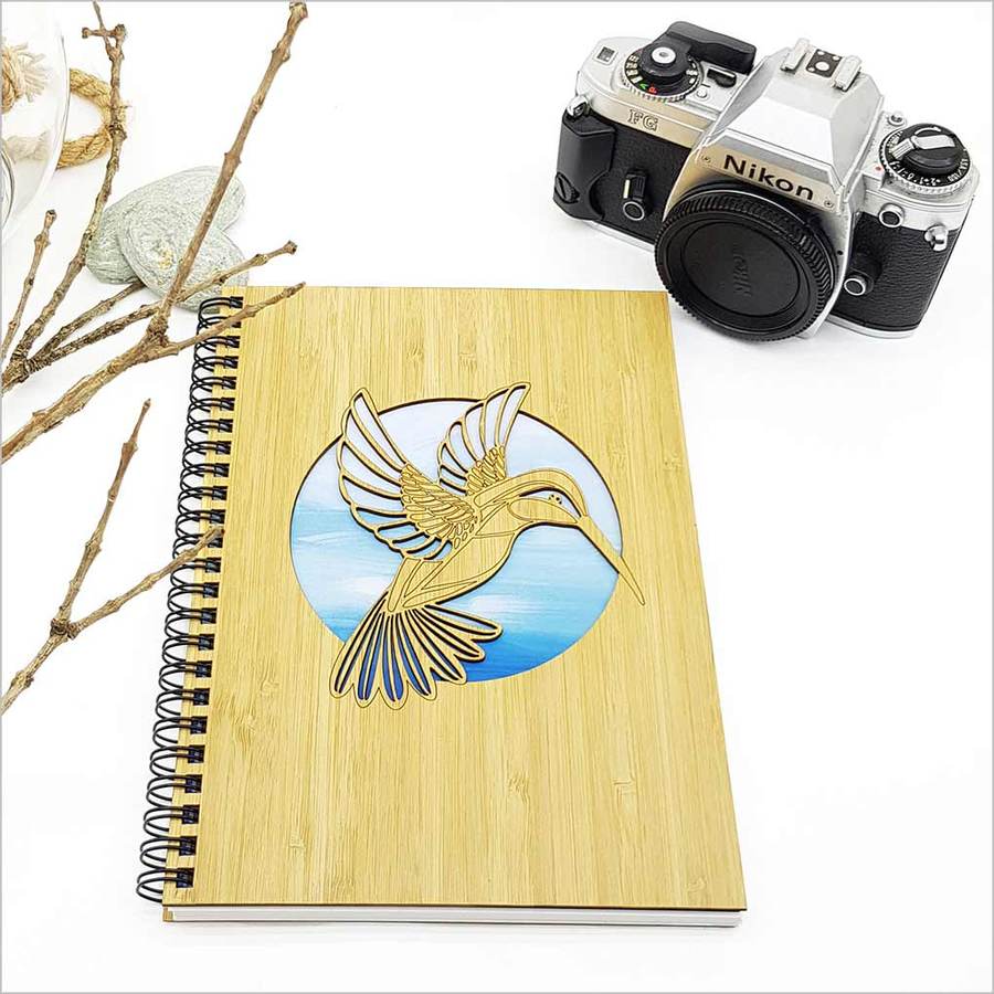 Small Bamboo Journal featuring a laser-cut hummingbird design, eco-friendly, 110 pages of premium cartridge paper.