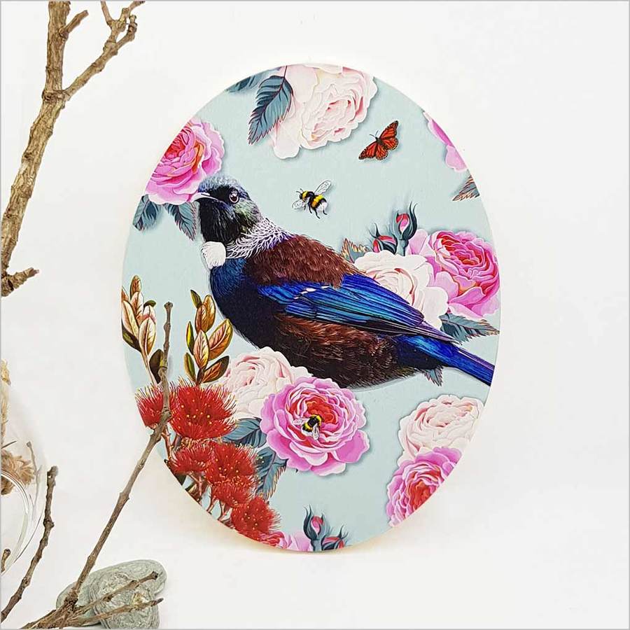 Kiwiana wall art featuring a floral Tui bird design on eco-friendly pine ply, perfect for nature-inspired decor.