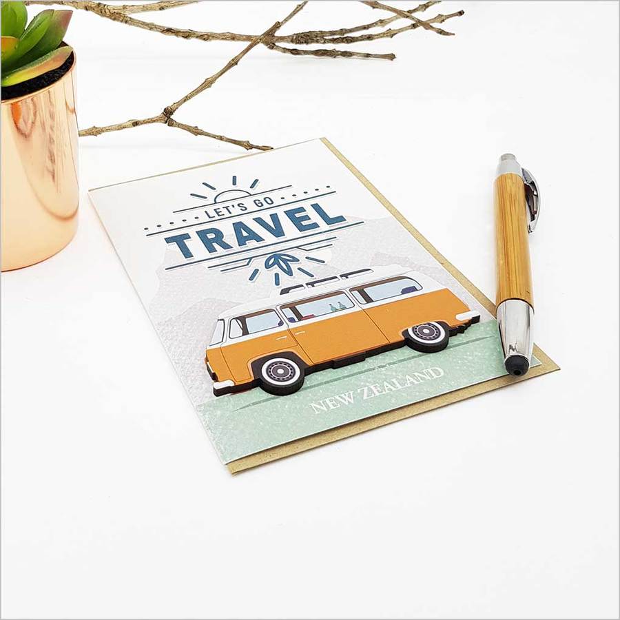 "Elegant 'Let's Go Travel' greeting card with embellishments, crafted from premium cardstock, perfect for travelers."