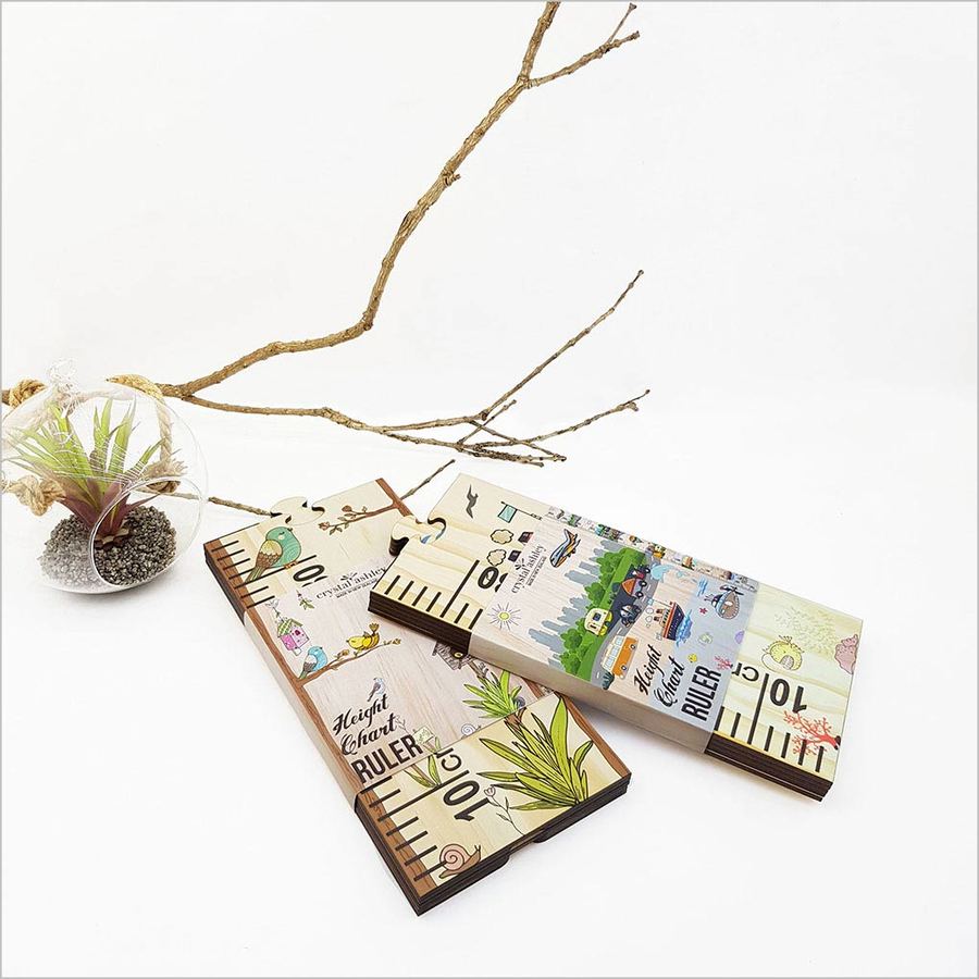 Vibrant transport-themed growth chart ruler made from eco-friendly pine veneer, measuring up to 1.5 metres for kids' height tracking.