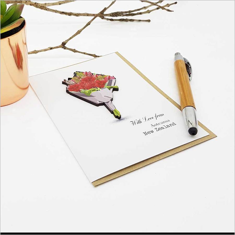 Pohutukawa Bouquet Greeting Card featuring elegant embellishments on textured cardstock, perfect for sharing heartfelt messages.