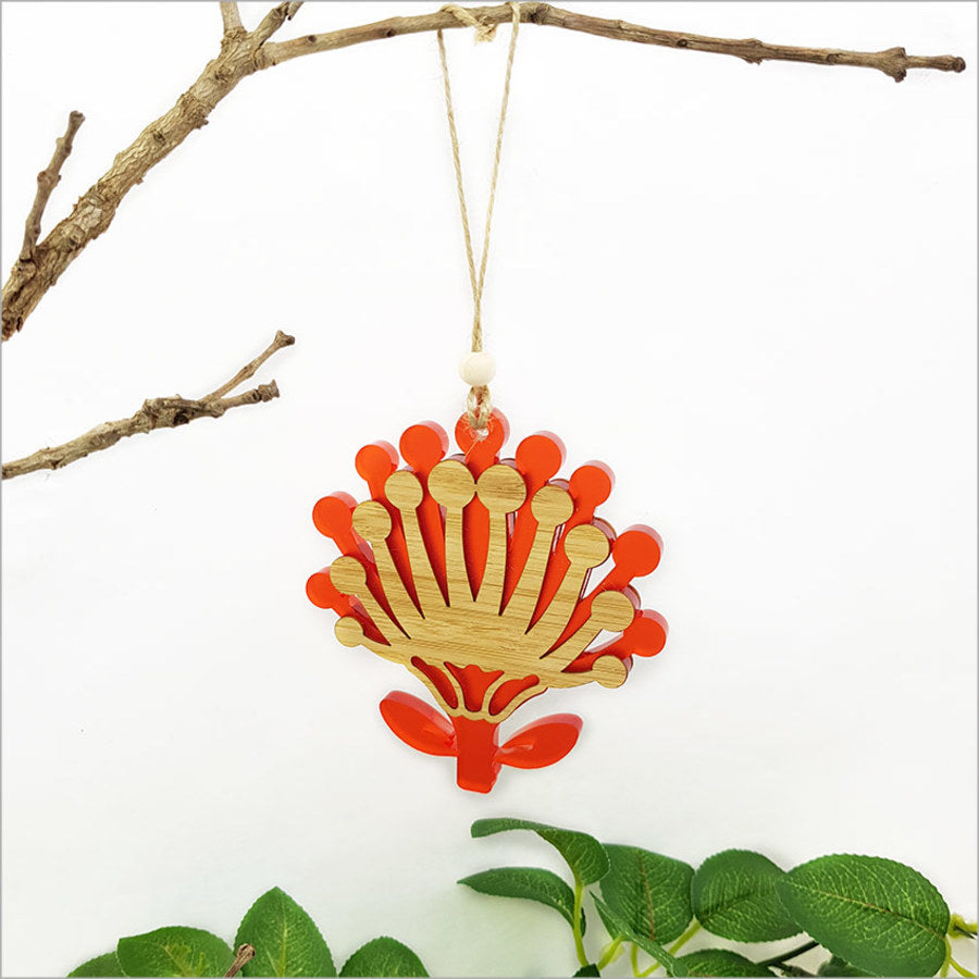 Elegant Pohutukawa flower ornament made from eco-friendly bamboo and red satin acrylic, perfect for festive decor or gift-giving.