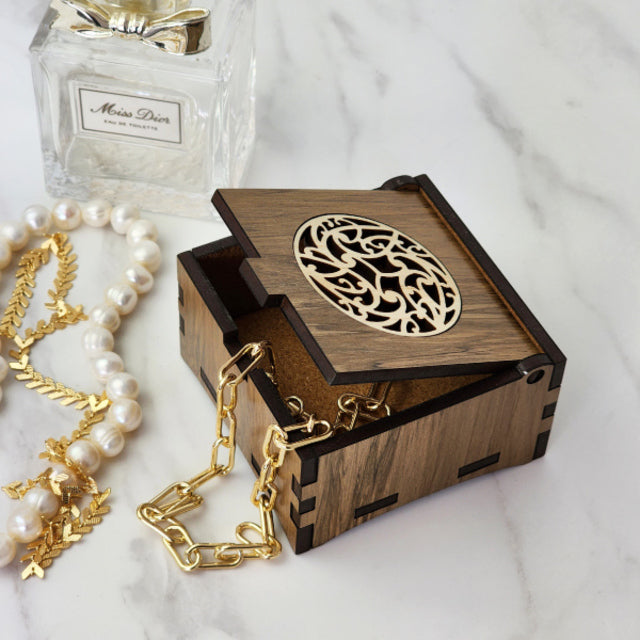 Unique 8cm trinket box crafted from reclaimed NZ riverwood, featuring rich colors and patterns, perfect for storing treasures.