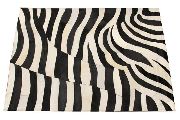 Luxurious cowhide leather rug with a unique zebra pattern, measuring 1.89 x 1.3m, perfect for adding elegance to any space.