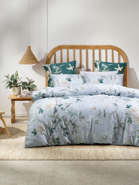 Luxurious powder blue duvet cover set featuring vintage foliage and birds, crafted from 100% cotton sateen, ideal for super king beds.