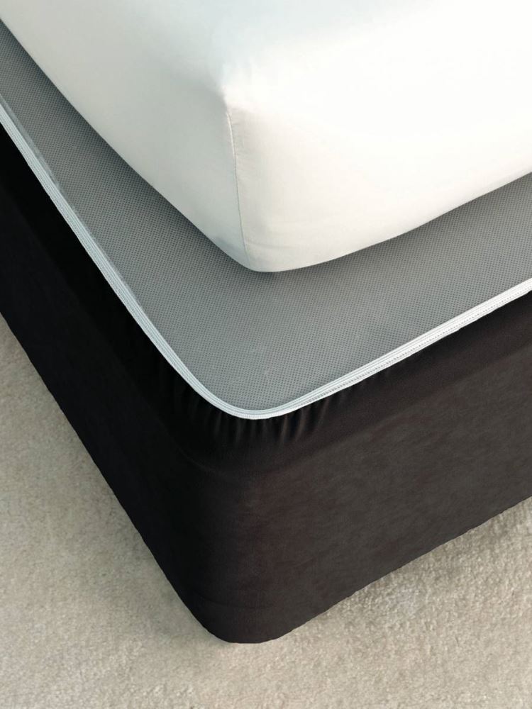 Elegant black faux suede king bedwrap, fitting various bases for a stylish and snug bedroom finish.