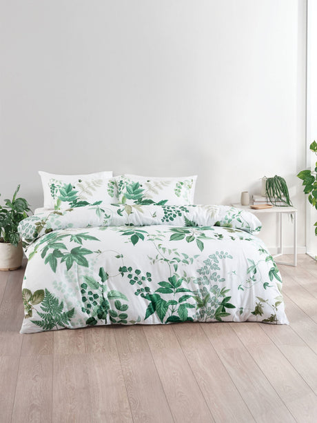 Luxurious white Australian Super King duvet cover set featuring lush foliage design, crafted from 100% cotton sateen.