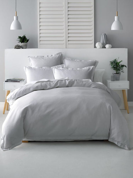 Californian King Duvet Cover Set Nova in SILVER, featuring 100% cotton waffle front and tailored flange for luxurious comfort.
