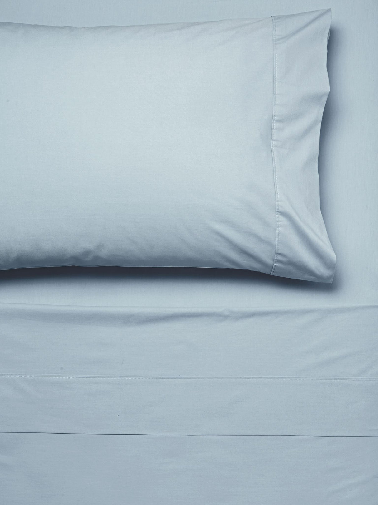 Queen Sheet Set in modern blue, crafted from 300T cotton percale for comfort, includes flat & fitted sheets, and pillowcases.