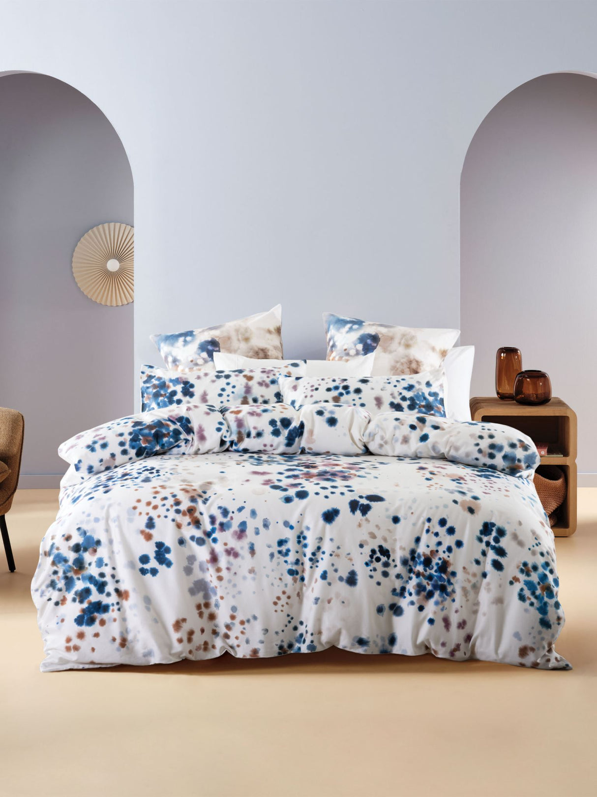 Queen duvet cover set featuring artistic watercolour droplets in rich blues, browns, and purples on soft cotton sateen.