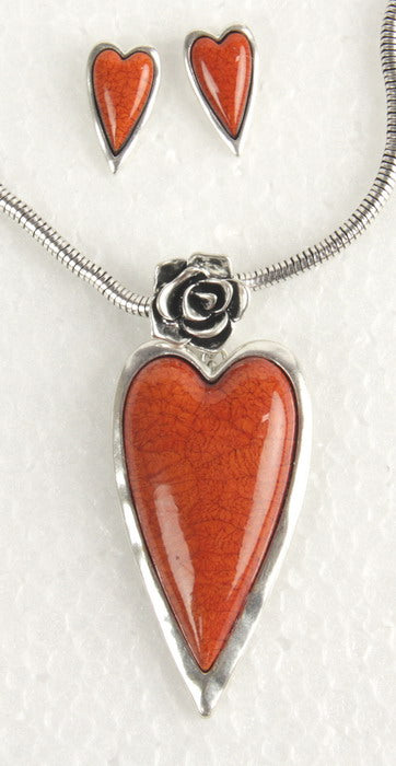 Orange heart resin earring and necklace set featuring rose motifs, with oxidized silver plating and a snake chain.