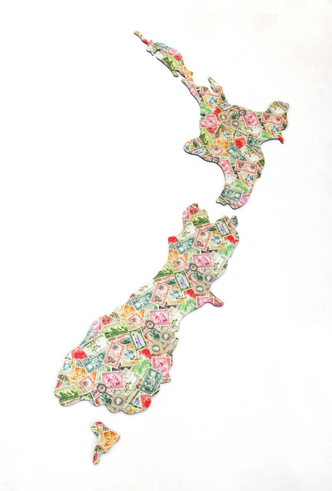 Vintage NZ map wall art featuring intricate stamp designs, perfect for kiwiana lovers and home decor enthusiasts.