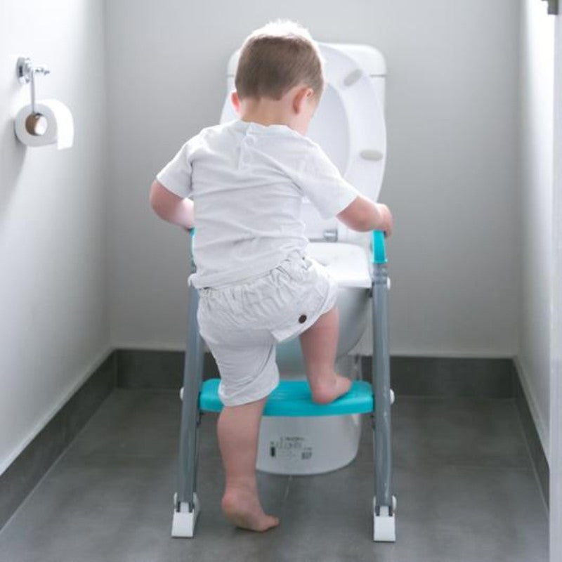Moose Step On Up Toilet Trainer in Aqua/Red, designed for toddlers to safely use the toilet with independence.