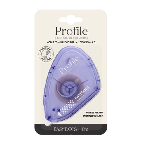 Compact adhesive dispenser with removable purple dots for precise crafting and easy repositioning in scrapbooking and card making.