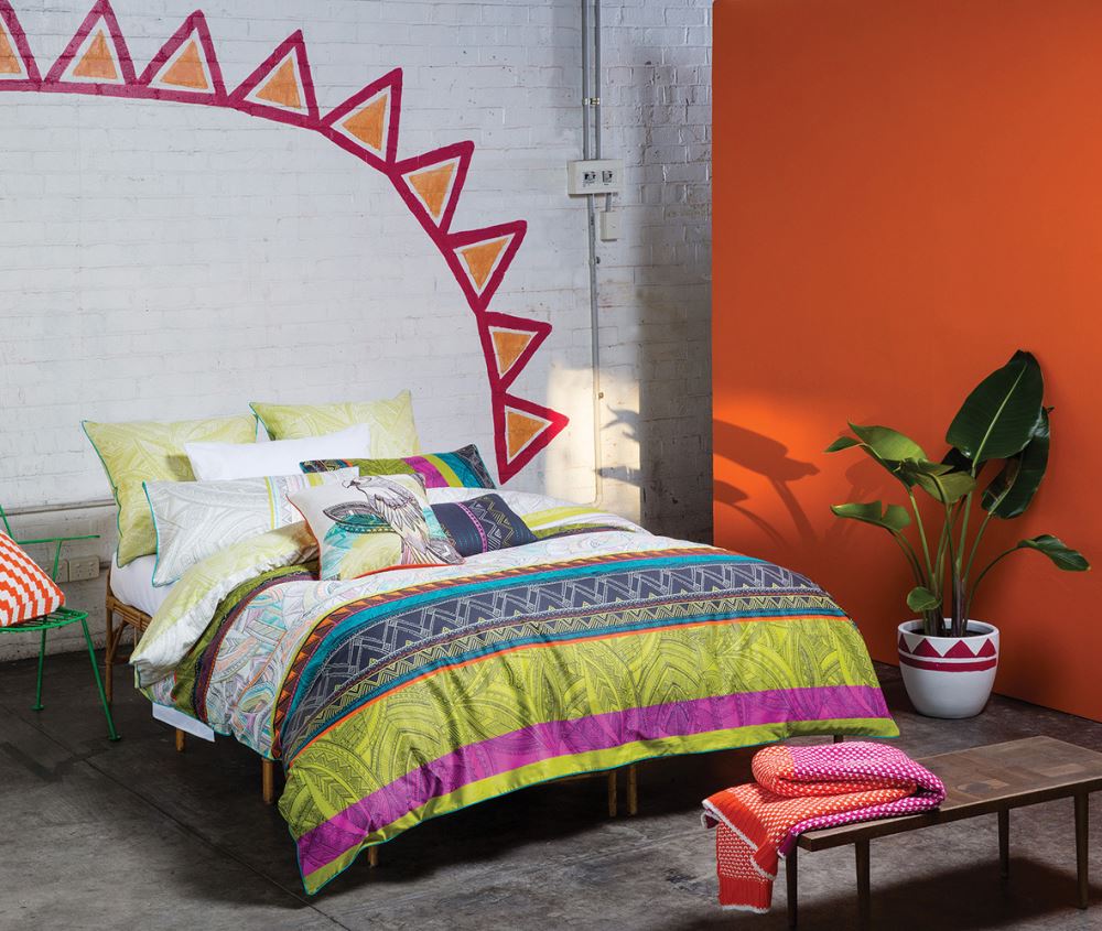Tanzo King duvet cover set featuring intricate tribal leaf patterns in vibrant Aztec colors on cotton fabric.