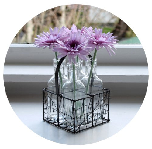 Lavender silk Gerbera flower, 55cm tall, perfect for weddings or home decor, with a lifelike appearance and durability.