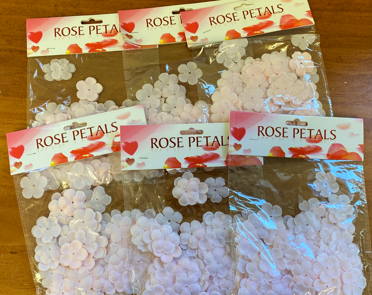Vibrant pink biodegradable flower petals in 6 packs, perfect for weddings, parties, and eco-friendly decor.