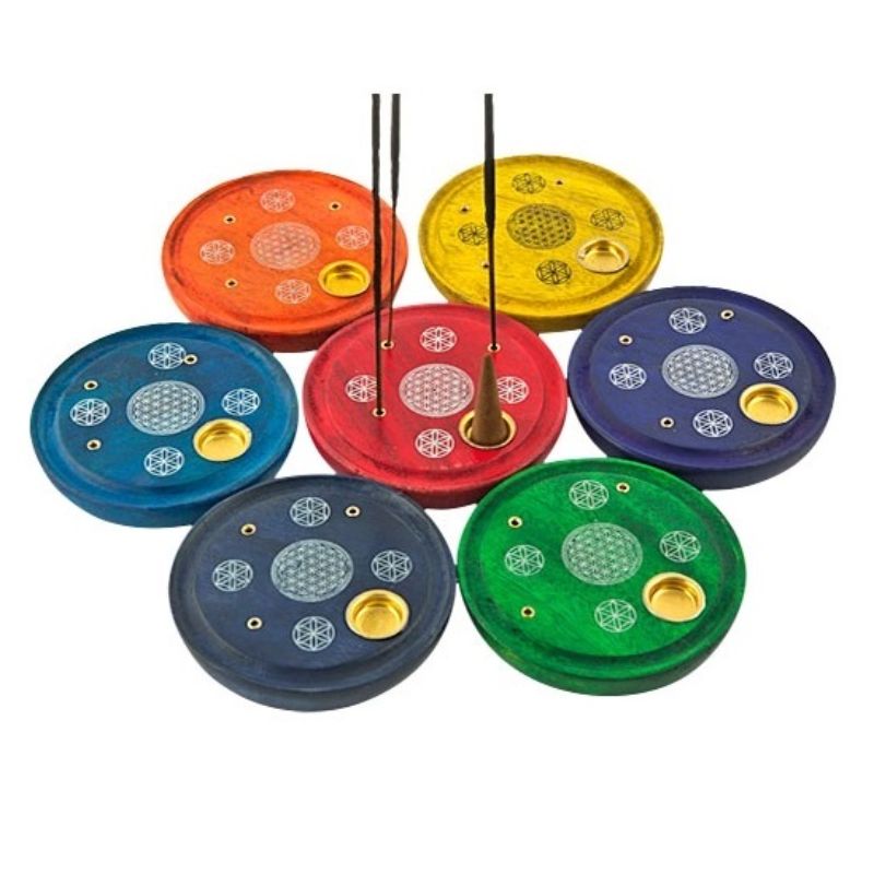Set of 7 round mango wood incense holders featuring chakra designs for meditation and spiritual harmony.
