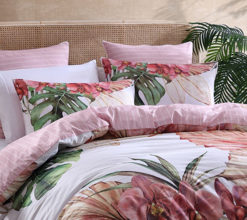 Super King Duvet Cover Set in Orchadia Pink featuring exotic orchids and tropical foliage, complemented by pink stripes and white piping.