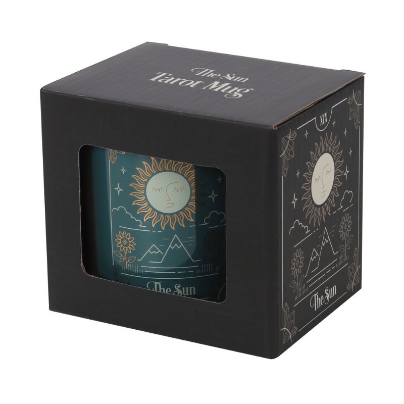 Ceramic mug featuring The Sun tarot design in green, white, and gold; 350ml capacity, dishwasher and microwave safe.