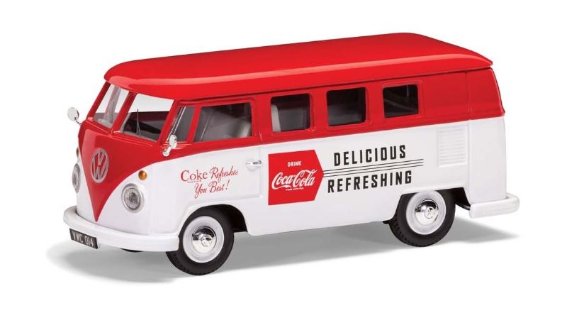 Diecast model of a Coca-Cola themed 1/43 scale VW Camper, showcasing vibrant vintage livery and detailed craftsmanship.