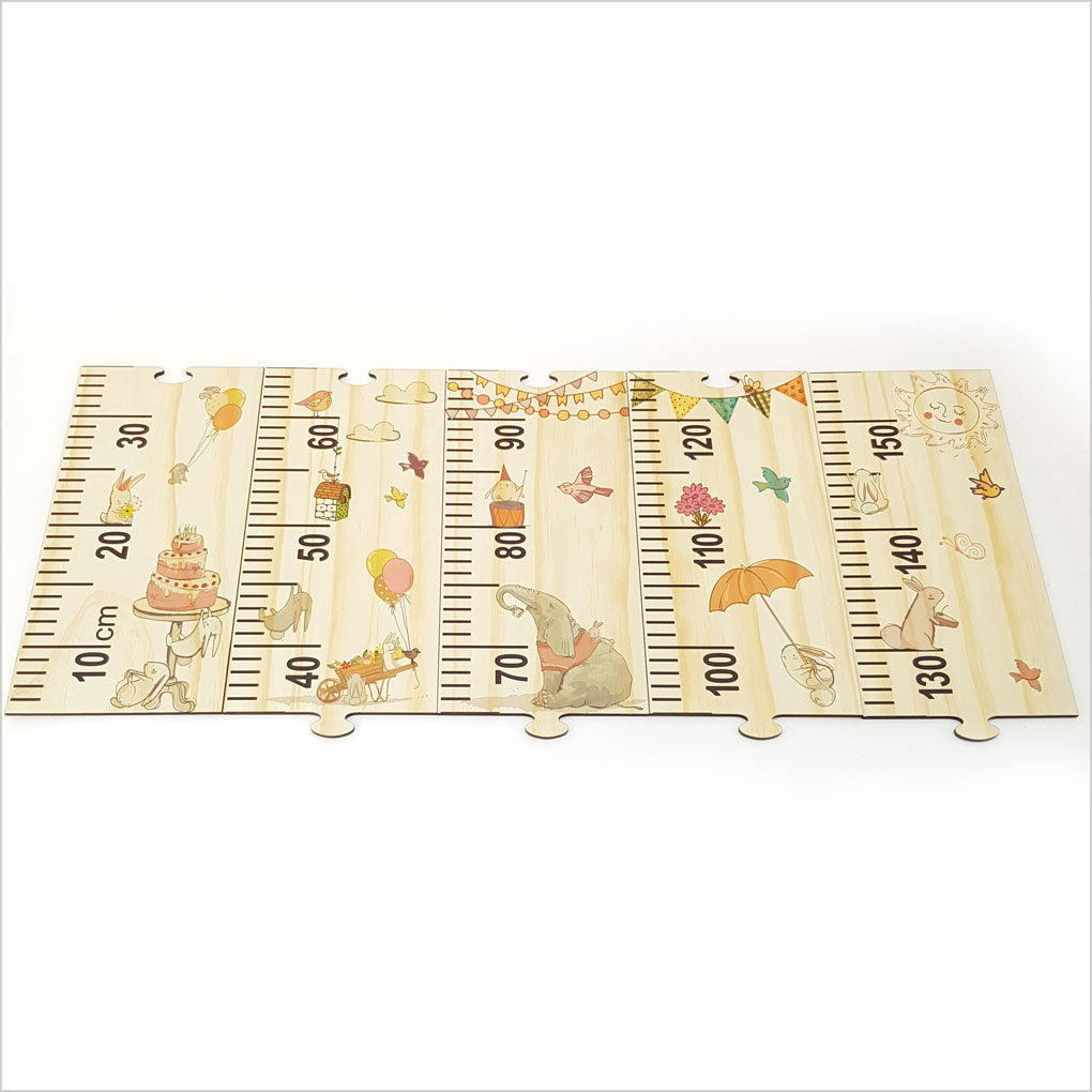 Woodland Party Growth Chart Ruler: eco-friendly pine veneer with charming creatures, features interactive puzzle pieces for growth tracking.