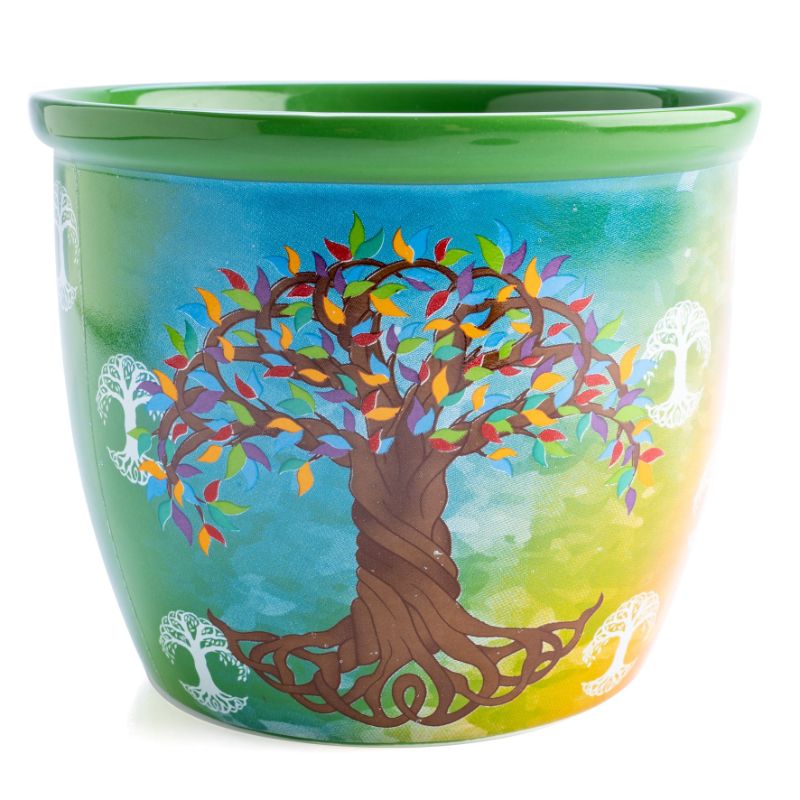 Ceramic smudge bowl featuring a vibrant tree of life design, crafted for safe burning of sage during spiritual rituals.