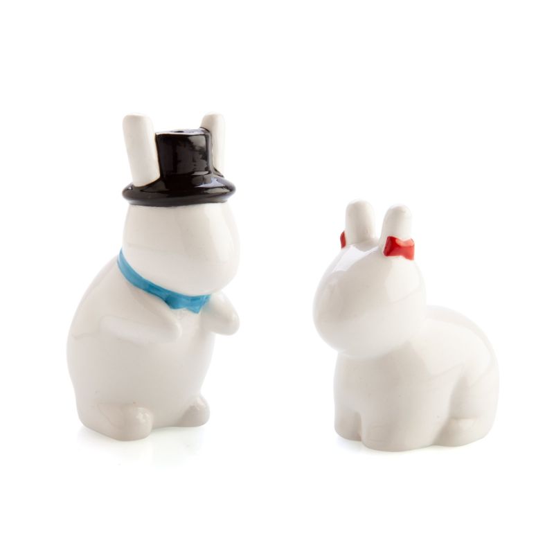 Cheeky ceramic salt and pepper shakers shaped like bunnies, featuring a top-hat bunny and a bow-tied bunny.