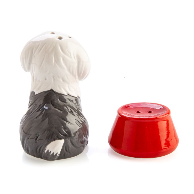 Adorable salt and pepper set featuring an Old English Sheepdog and a red bowl, perfect for dog lovers' dining decor.