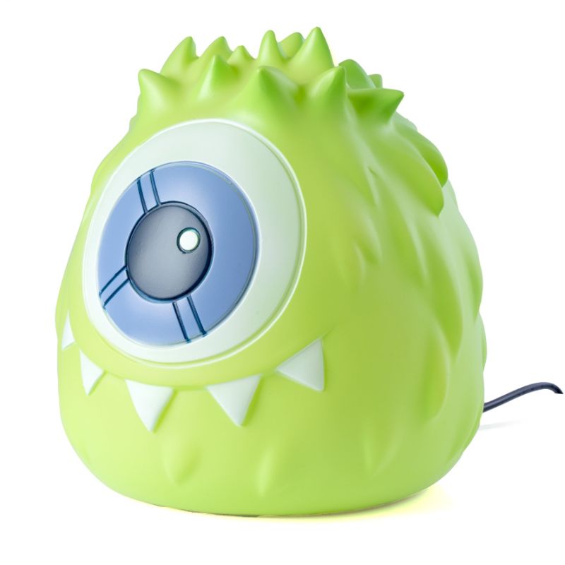 Adorable green Monsterling table lamp, 16cm tall, providing a warm glow, ideal for children's rooms and safe for kids.