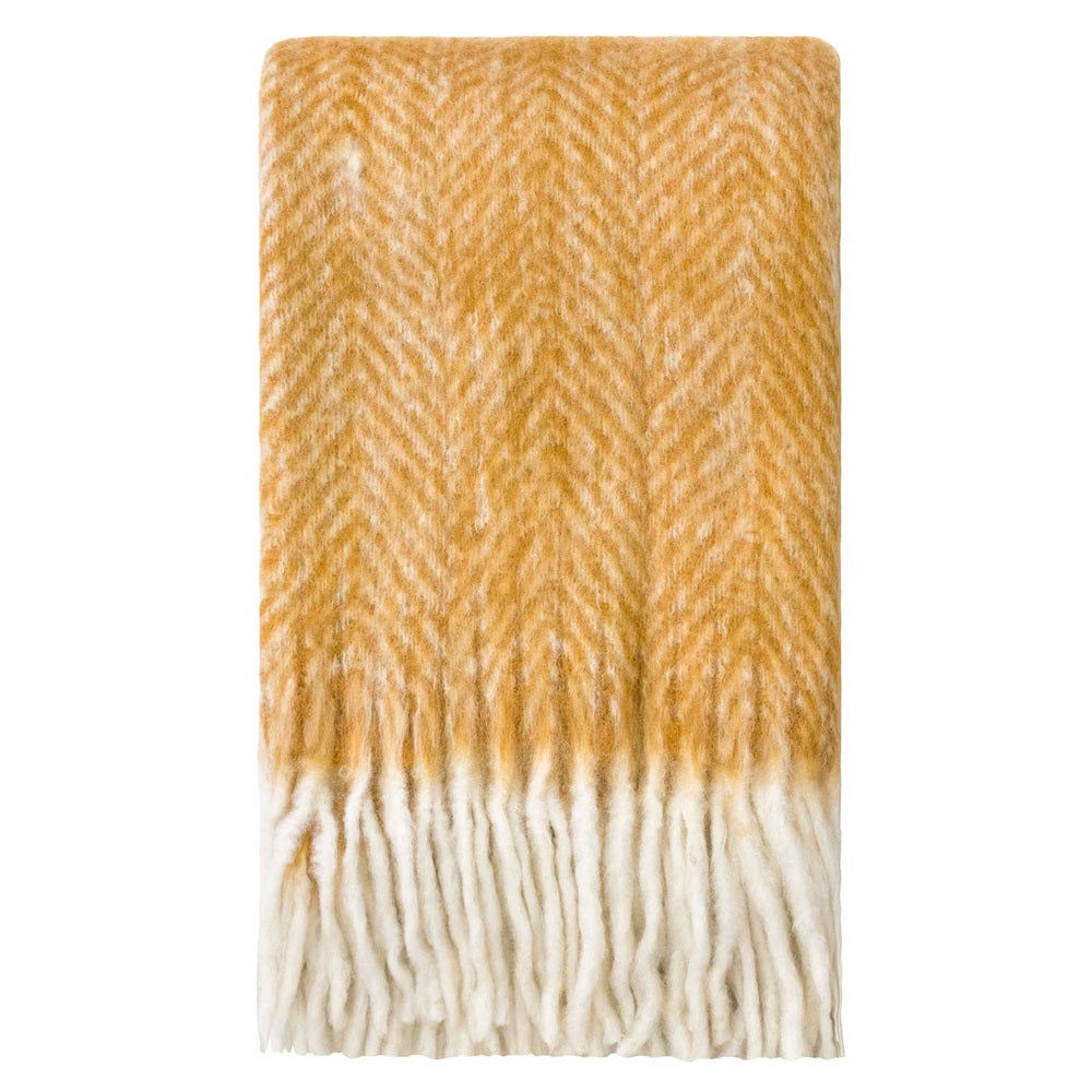 Cozy herringbone throw in wood thrush color, made of a soft mohair blend, perfect for chilly evenings.