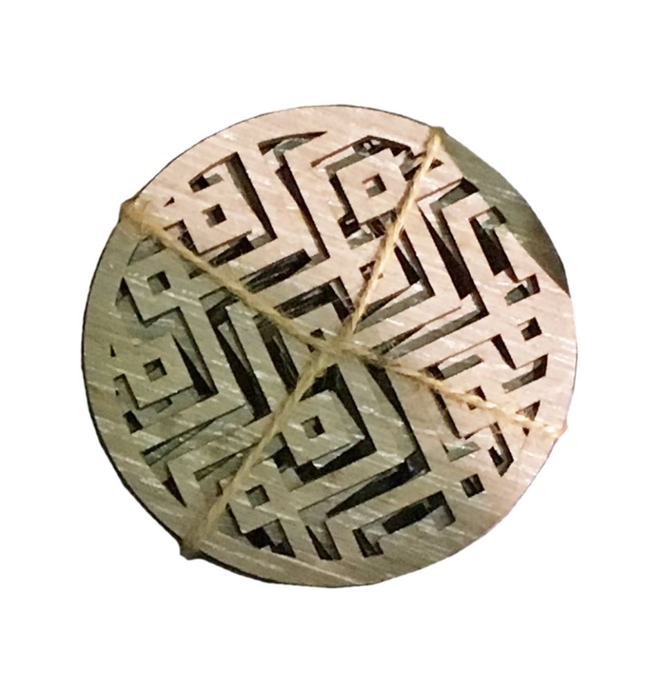 Set of 6 Aztec-inspired wooden coasters, featuring vibrant designs and durable plywood construction for stylish surface protection.