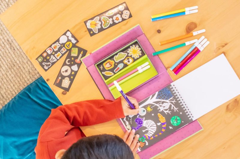 Spooky Colouring Set featuring ghostly and witch designs, perfect for Halloween creativity and family fun.