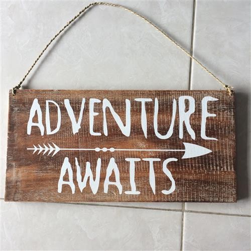 Natural and white "Adventure Awaits" plank sign, 40cm x 20cm, inspiring wanderlust and rustic charm for any room.