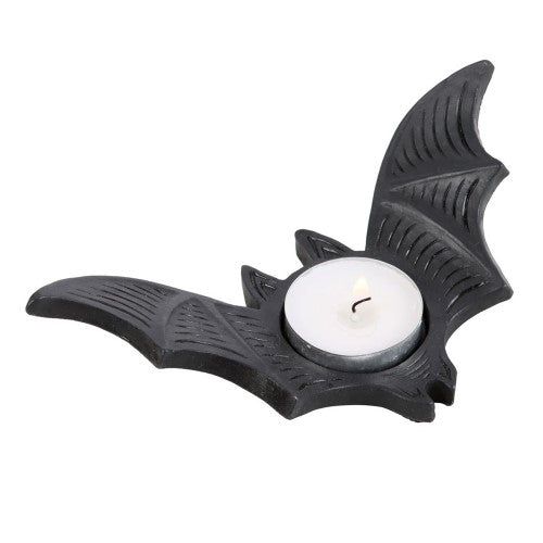 Bat Tealight Candle Holder in black resin features a flying bat design, perfect for Halloween decor and creating ambient shadows.