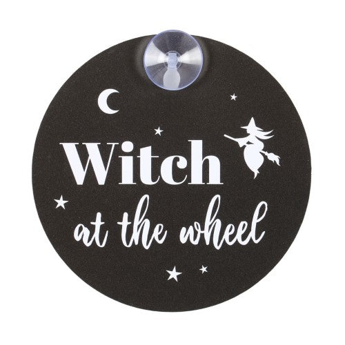 Enchanting "Witch at the Wheel" window sign featuring moon and stars on durable black and white PVC, perfect for home or car decor.