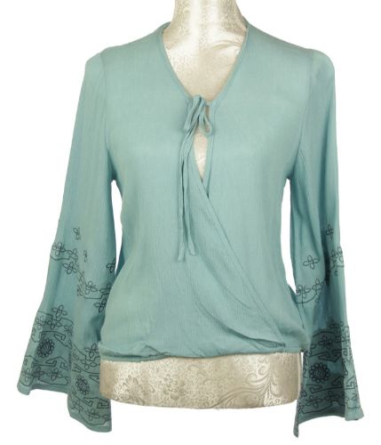Lightweight blue summer top with intricate embroidery, designed for comfort and style, perfect for casual and beach outings.