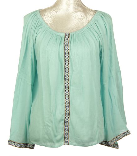 Mint top with ribbon trims, crafted from 100% viscose, combining comfort and elegance for versatile styling.