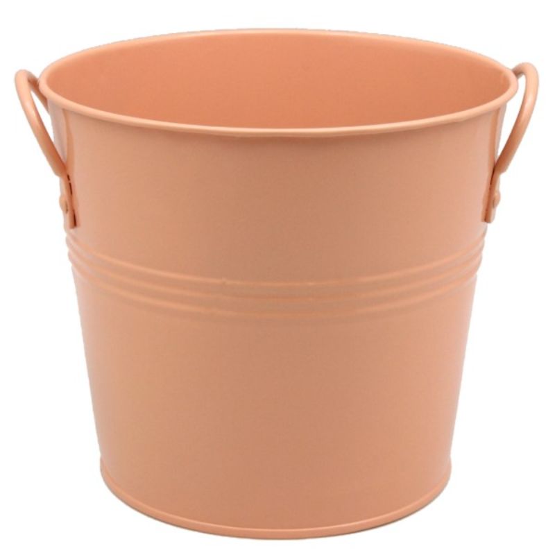 Apricot metal bucket with two handles, 18cm diameter, perfect for decor, storage, or as a stylish plant pot holder.