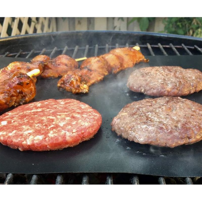 Non-stick BBQ liner for healthier grilling; reusable, PFOA-free, ideal for meats and veggies, pack of 2, easy to clean.