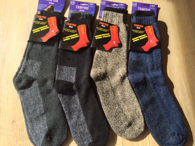 Warm and comfortable 100% wool double-layer socks, ideal for extreme conditions, with cushioned sole and seamless toe design.