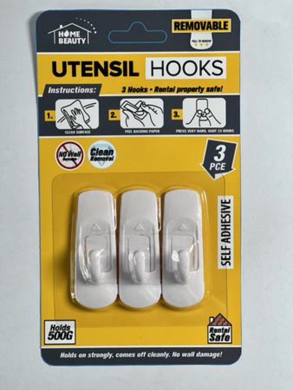Self-adhesive hooks in 12 pack, each holds 0.5kg; perfect for versatile home organization without wall damage.