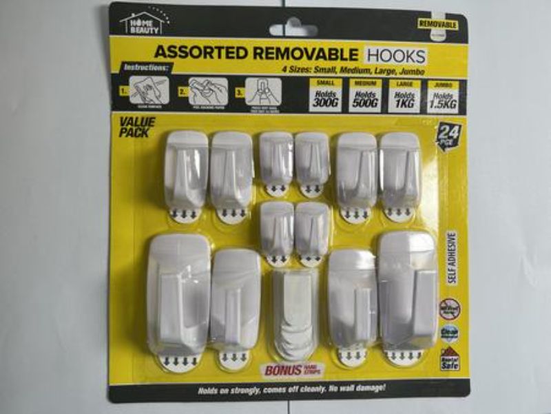 Versatile assorted removable hooks set for home organization, easy to install, and no wall damage with 12 sets included.