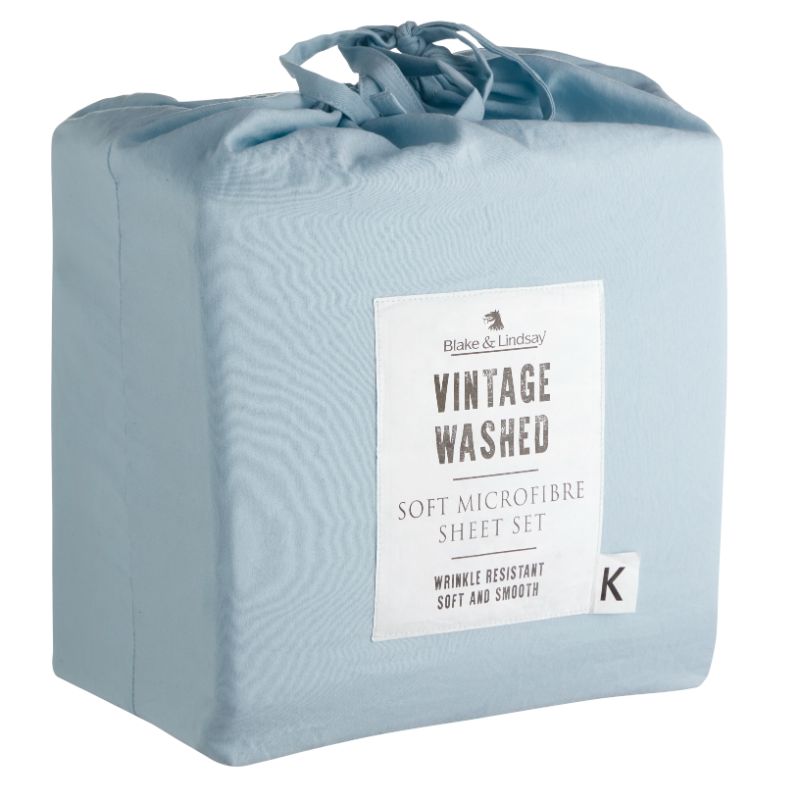 King sheet set in washed microfibre sky with soft texture, wrinkle resistance, and elasticised fitted sheet for deep mattresses.
