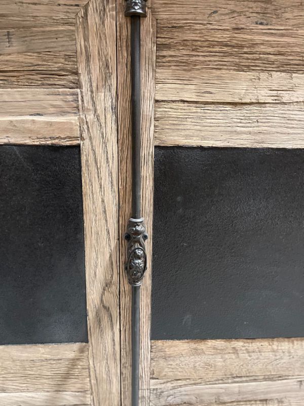Timeless reclaimed oak buffet with four zinc panels and contrasting twist lock handles, perfect for any home decor.
