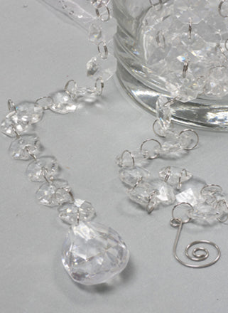 Acrylic crystal garland with sparkling drops, perfect for adding glamour and elegance to weddings and events.