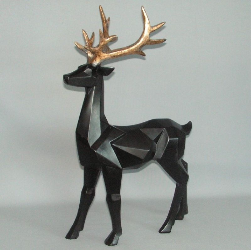 Elegant black and gold geometric stag statue, 46cm tall, adds sophistication and charm to any home decor.