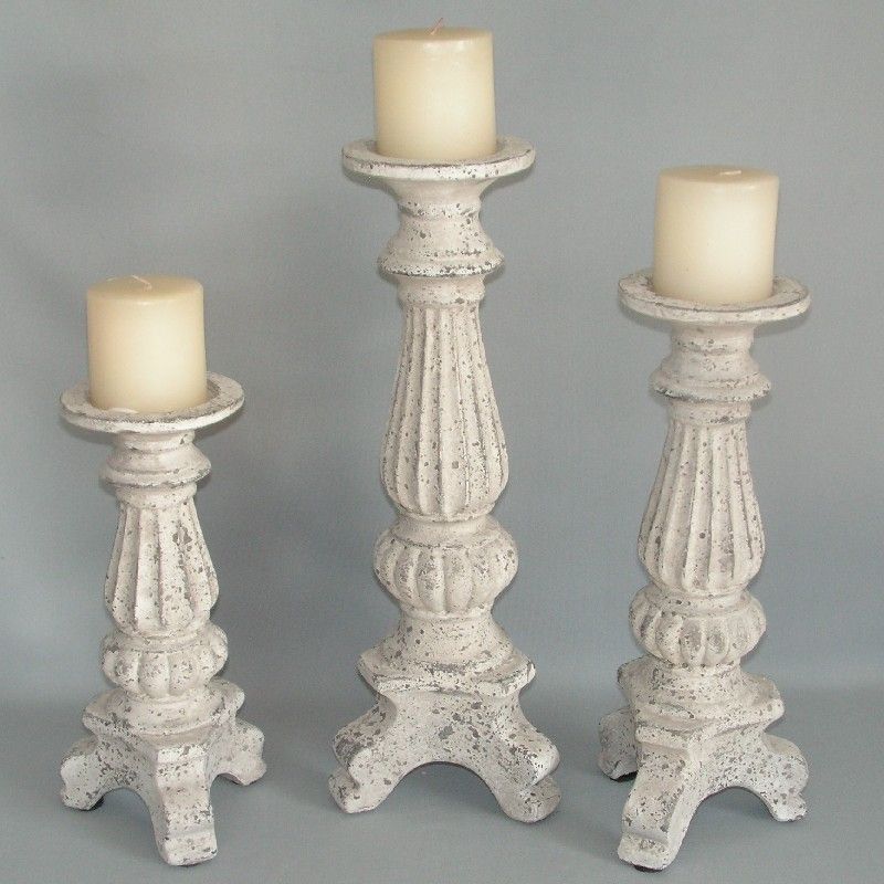 Elegant 3-foot Barouque candlestick with intricate designs, perfect for weddings and home decor, holding standard candles securely.